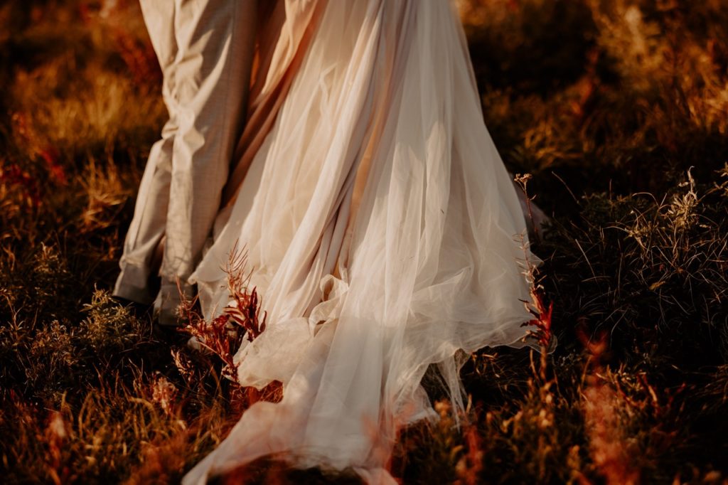couple in mountains in wedding attire
Flathead National Forest Adventure Elopement 
montana