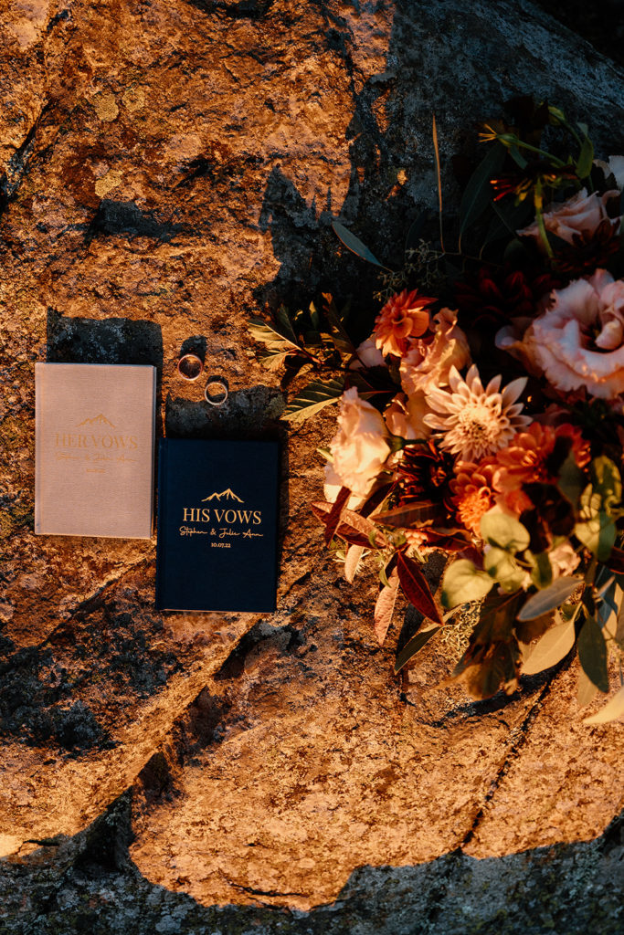 flat lay of vow books and florals