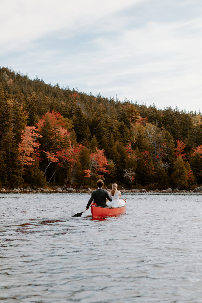 Couple canoeing Jordan pond Acadia national park