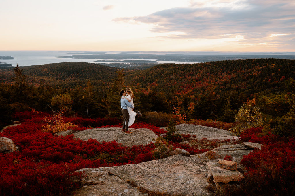 couple hiking in acadia